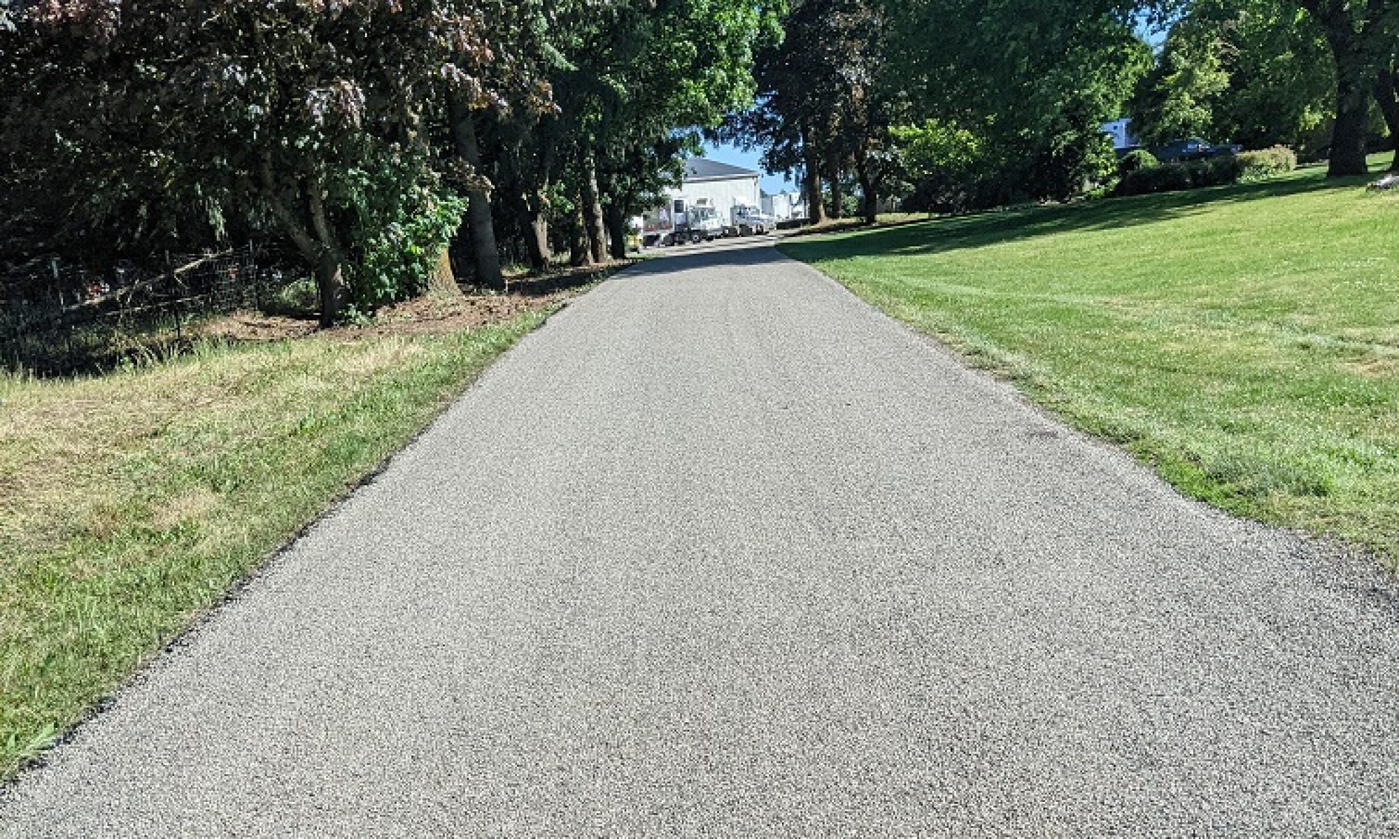 Shared private lane being chip sealed.